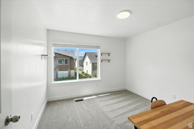 Unfurnished room featuring carpet flooring and baseboards | Image 16