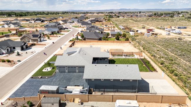 Aerial perspective of suburban area featuring a mountainous background | Image 115