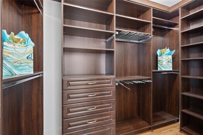 The primary closet is stunning with custom built-ins! | Image 25