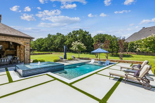 Custom Heated Pool and Infinity Spa Create a Backyard Oasis | Image 32