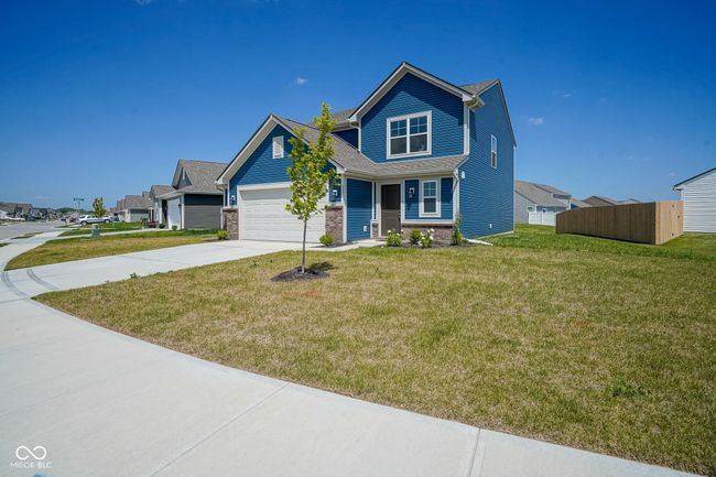 craftsman-style home featuring driveway and a garage | Image 4