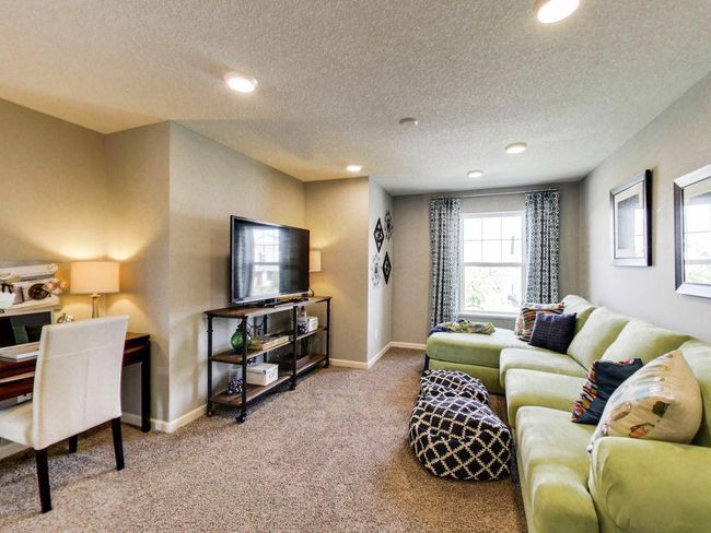Photos are of a former model home. Actual home is under construction. | Image 13