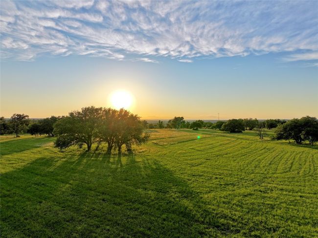 View of green lawn with a rural view | Image 24