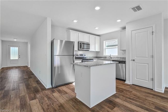 1261 Bush St W, House other with 3 bedrooms, 2 bathrooms and 2 parking in IMMOKALEE FL | Image 9