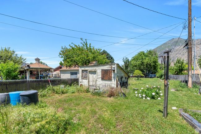 View of yard featuring a gazebo | Image 11