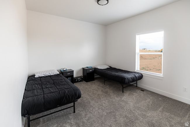 Bedroom with baseboards and carpet floors | Image 26
