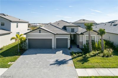 11387 Canopy Loop, House other with 3 bedrooms, 3 bathrooms and null parking in Fort Myers FL | Image 2