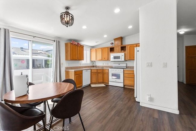 Dining room looking into kitchen | Image 5