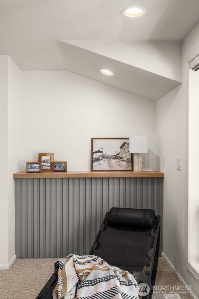 Invite guests into a restful corner of the home surrounded by garden views and quiet ambiance. | Image 22