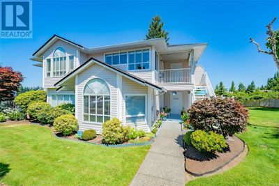 6042 Cedar Grove Dr, Townhouse with 2 bedrooms, 2 bathrooms and 39 parking in Nanaimo BC | Image 1