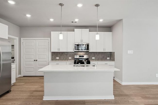 Photo is not of the actual home but is an inspirational photo of builder’s model home and may depict options, furnishings, and/or decorator features that are not included. | Image 4