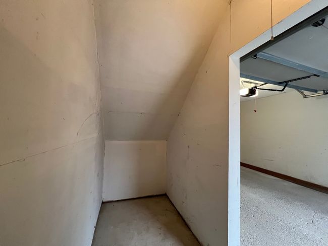 THE GARAGE CONTAINS A LG STORAGE AREA (4'X11') | Image 6