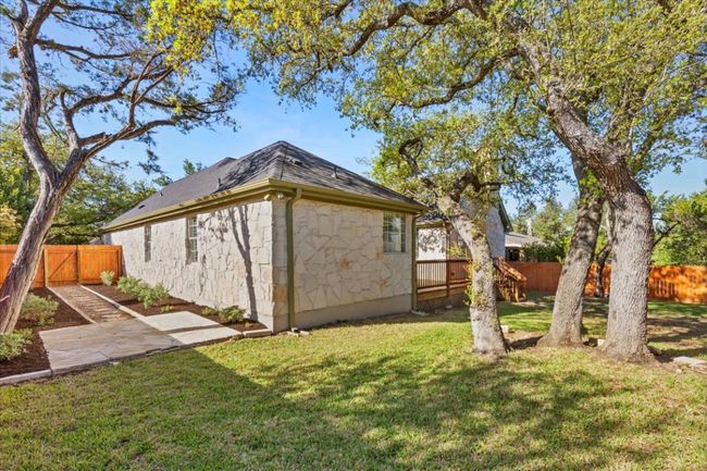There's plenty of space beneath the trees for a swing or hammock, perfect for relaxing. | Image 32