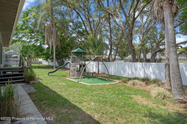 11242 Riddle Dr, House other with 3 bedrooms, 3 bathrooms and null parking in SPRING HILL FL | Image 56