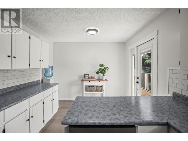 7708 Coldstream Creek Rd, House other with 4 bedrooms, 3 bathrooms and 2 parking in Coldstream BC | Image 9