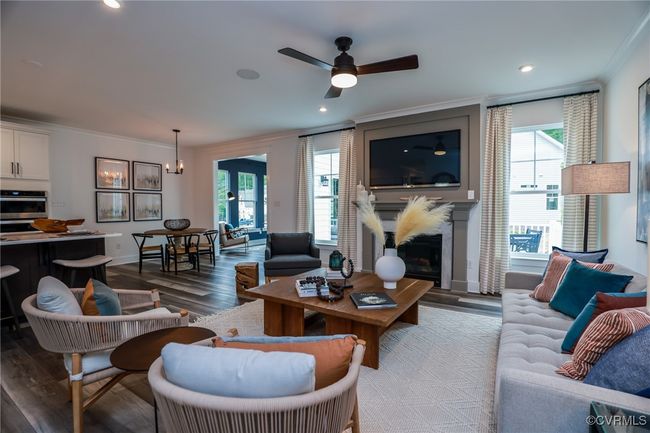VIRTUAL STAGING. Photo represents the plan with virtual staging. Spacious and open family room. | Image 12