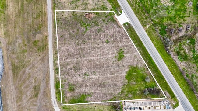 Aerial view of property and surrounding area featuring property boundaries highlighted | Image 23