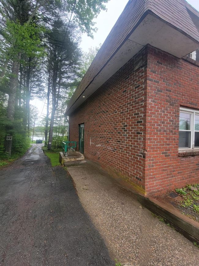 View of side of home featuring brick siding | Image 21