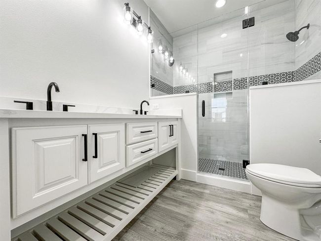 Photos are for illustrative purposes only, showcasing a home built by the same builder. Features such as colors, appliances, fixtures, and finishes are subject to change and may vary from those shown. Please verify details with the builder for the most accurate representation of the final home. | Image 7