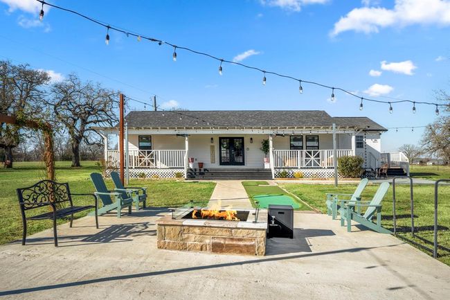 A firepit courtyard extends the living space outdoors—offering a place to gather, relax, and enjoy the peaceful setting. | Image 5