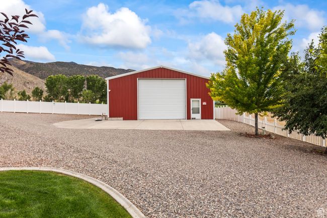 Detached garage featuring a mountain view | Image 102
