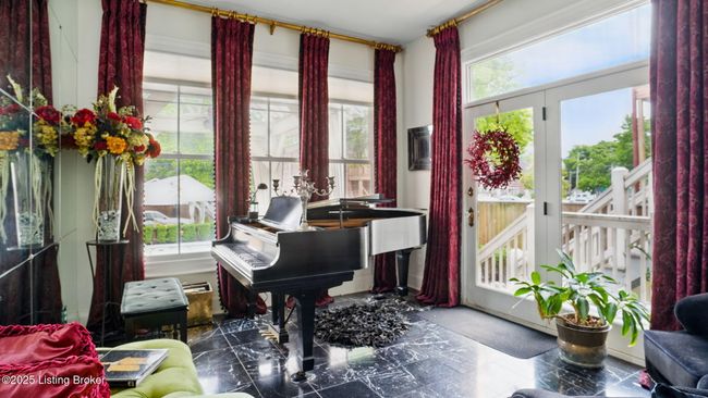 Sunroom/Music room addition on 1st floor rear overlooking the rear gardens. | Image 19