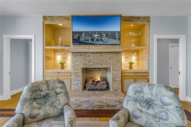 Gas fireplace with built-in shelving. | Image 15