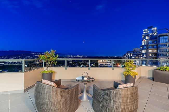 Patio at twilight with a balcony | Image 17