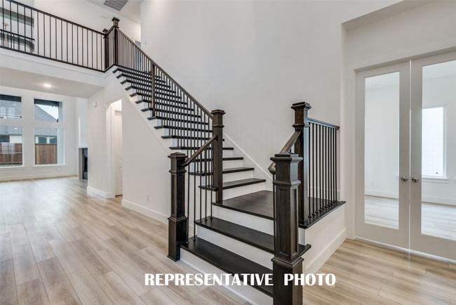 This gorgeous open and airy entry is the perfect place to welcome friends and family into your stunning new home! REPRESENTATIVE PHOTO. | Image 4