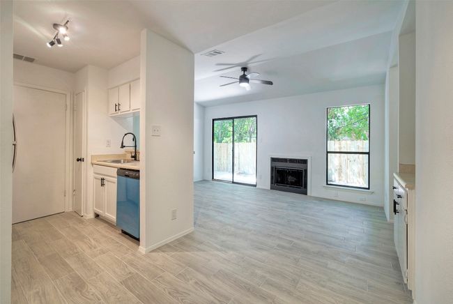 Kitchen with dishwasher, light countertops, and healthy amount of natural light | Image 7