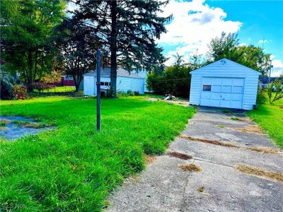 View of yard with an outbuilding and a garage | Image 3