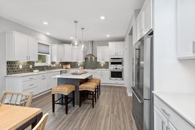 Photo is of the actual home. Host many guests with this fabulous kitchen! | Image 3