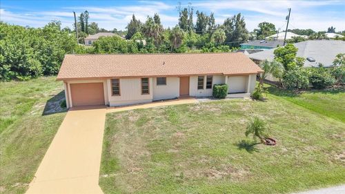 528 Magnolia Ave Nw, PORT CHARLOTTE, FL, 33952-7818 | Card Image