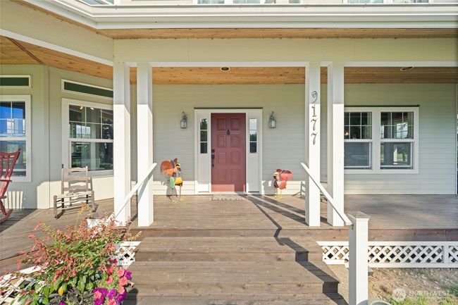 Front door with welcoming wrap around front porch! | Image 5