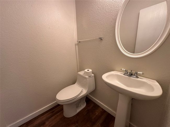 Bathroom featuring wood finished floors | Image 18