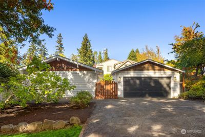 Enjoy single level living in this Winslow rambler located moments from schools, parks, restaurants, shopping and the ferry | Image 1