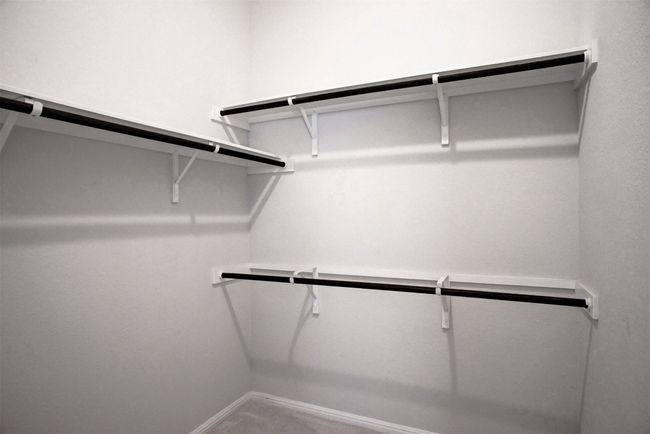 View of walk in closet | Image 24