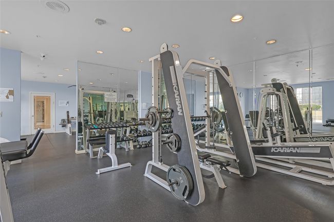 Exercise room featuring recessed lighting | Image 21