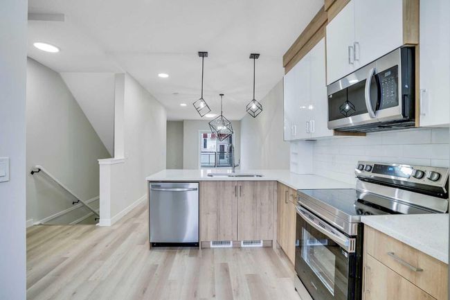 306 Red Sky Villas Ne, Townhouse with 3 bedrooms, 4 bathrooms and 1 parking in Calgary AB | Image 11