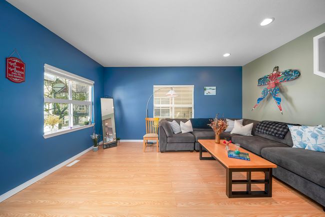 Living room with recessed lighting, wood finished floors, and baseboards | Image 26