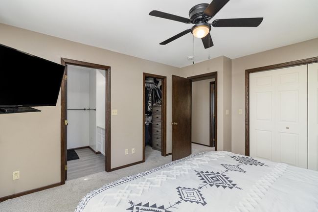 Five spacious bedrooms all on the main level, including a primary suite with a private ¾ bath, walk-in closet, and an additional closet for extra storage! | Image 9