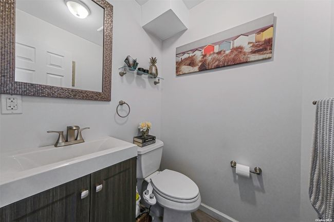 Convenient Newer Powder Room , Just off Bar Area and Family Room | Image 24