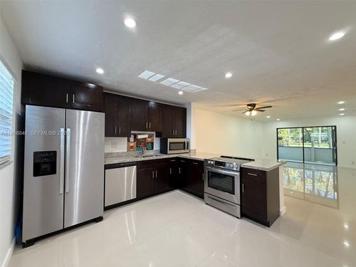 103-6095 N Sabal Palm Blvd, Tamarac, FL, 33319-2643 | Card Image