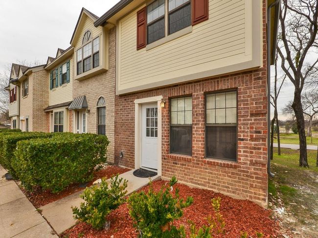 View of property featuring brick siding | Image 4