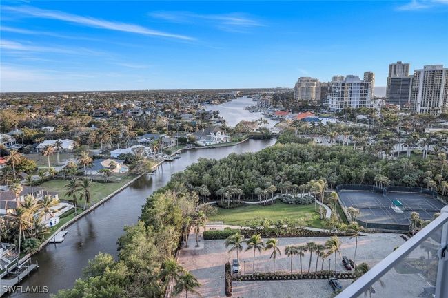 View from East Lanai of Venetian Bay & City Views. Note the large parking lot for overflow parking for Baypointe and Naples Cay. | Image 26