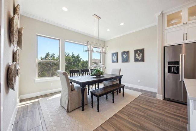 Dine in uncrowded comfort! This light & bright Dining area was built with a 2 ft extension to add additional space. | Image 14