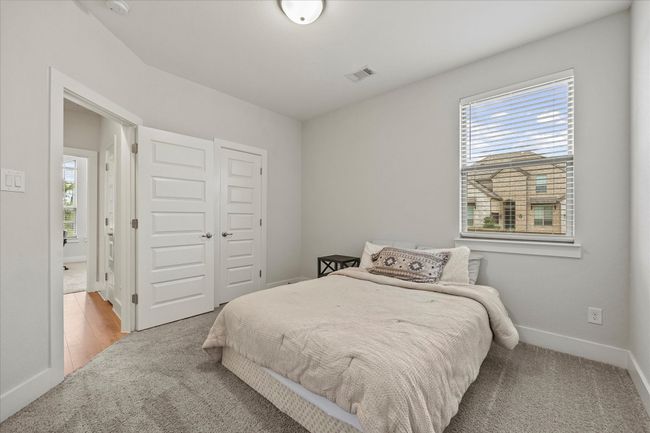 Guest bedroom opens onto full bath | Image 9
