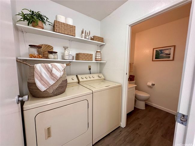 Conveniently located laundry area just off the half bathroom | Image 7