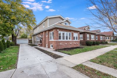 7934 S Oglesby Avenue, House other with 4 bedrooms, 2 bathrooms and 2 parking in CHICAGO IL | Image 1