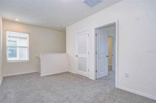 9176 Forge Breeze Loop, House other with 5 bedrooms, 3 bathrooms and null parking in WESLEY CHAPEL FL | Image 8